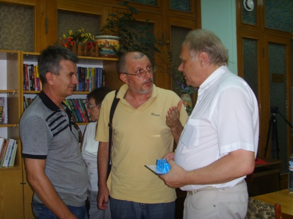 Н. Пономаренко, В. Гладышев и В. Христенко